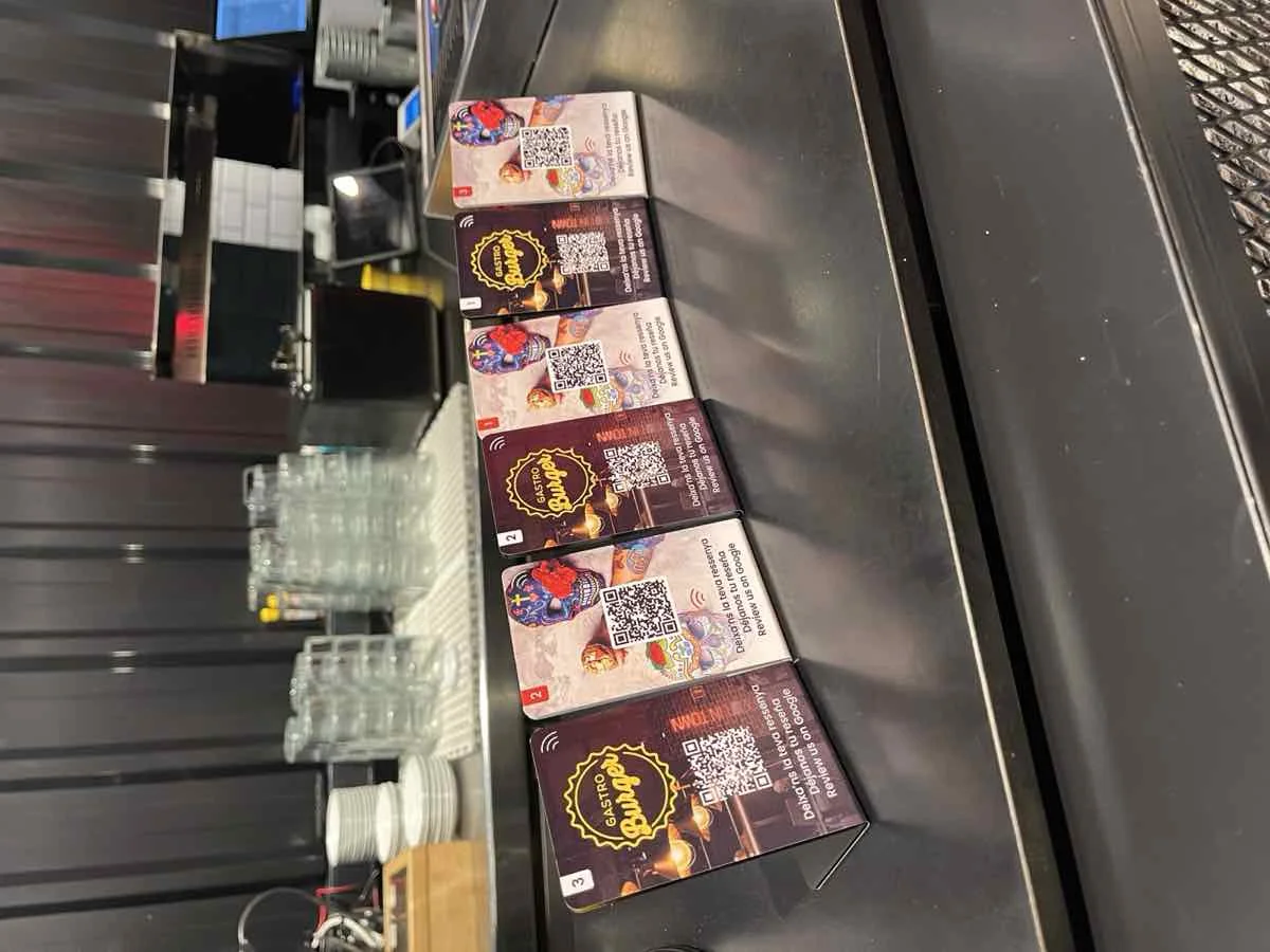 A row of personalized NFC cards for Gastro Burger